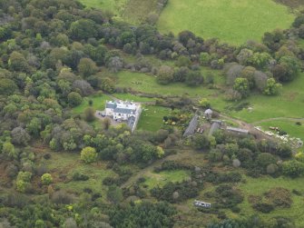 Oblique aerial view centred on the country house, taken from the NE.