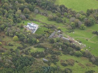 Oblique aerial view centred on the country house, taken from the NNE.