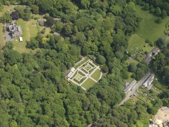 General oblique aerial view of Shambellie House and policies, taken from the SW.