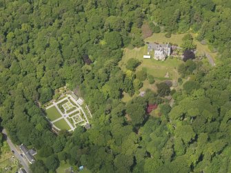 General oblique aerial view of Shambellie House and policies, taken from the SE.