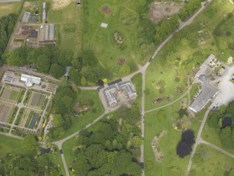 Oblique aerial view of Threave House stables and kitchen garden, taken from the SSE.