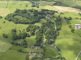General oblique aerial view of Threave House and policies, taken from the NE.