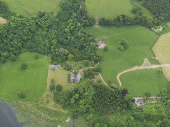 General oblique aerial view of Cumstoun House and policies, taken from the E.