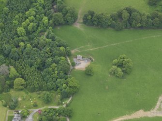 Oblique aerial view of Cumstoun House doocot, taken from the ENE.