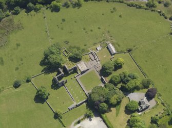 Oblique aerial view of Dundrennan Abbey, taken from the NW.