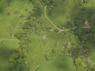 General oblique aerial view of Plunton Castle, taken from the SSW.