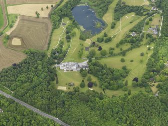 General oblique aerial view of Cally House and policies, taken from the S.