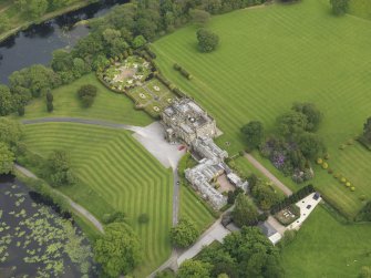 Oblique aerial view of Kinmount House and rose garden, taken from the NW.
