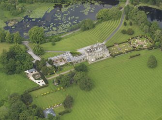 Oblique aerial view of Kinmount House and rose garden, taken from the SSW.