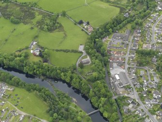 General oblique aerial view centred on Minnigaff Old Parish Church, taken from the SSW.