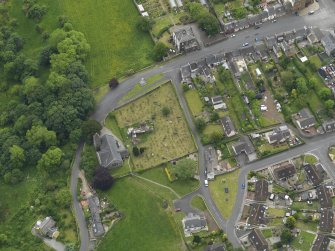 Oblique aerial view centred on Wigtown Parish Church, taken from the N.