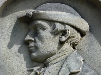 Detail of portrait sculpture on monument in memory of John Runciman (died 1768). Located at Canongate Cemetery.