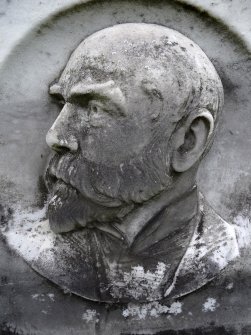 Detail of portrait sculpture on monument in the Grange Cemetery.