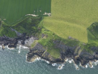 Oblique aerial view of Cruggleton Castle, taken from the ESE.
