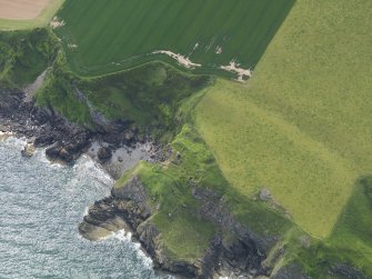 Oblique aerial view of Cruggleton Castle, taken from the E.