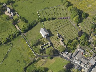 Oblique aerial view of Whithorn Parish Church and priory, taken from the SSE.