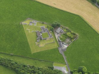 Oblique aerial view of Glenluce Abbey, taken from the NE.