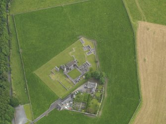 Oblique aerial view of Glenluce Abbey, taken from the NNW.