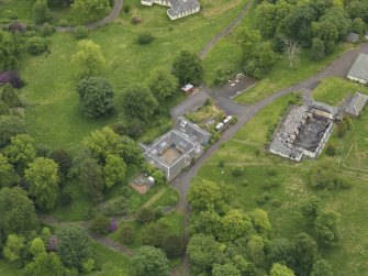 Oblique aerial view of Birkwood House and policies, taken from the WNW.