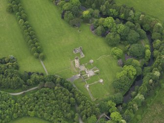 Oblique aerial view of Eglinton Castle, taken from the SE.