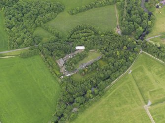 Oblique aerial view of Eglinton Country Park walled garden, taken from the SSW.