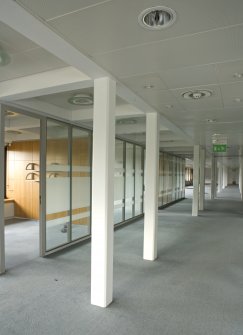 Interior. View of lower ground floor office accommodation, taken from N