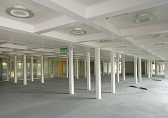 Interior. General view of lower ground floor office accommodation, taken from NW