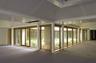 Interior. View of atrium at lower ground floor level, taken from SE