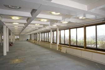 Interior. General view of ground floor office space and W windows, taken from NNE