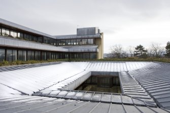 View across leaded roofs and atrium, taken from 1st floor level N walkway.