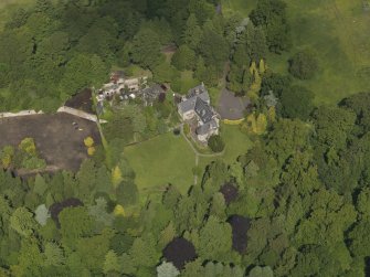 Oblique aerial view of Treesbank House and stables, taken from the S.