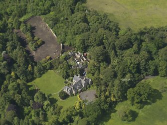 Oblique aerial view of Treesbank House and stables, taken from the ENE.