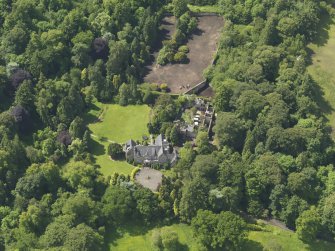 Oblique aerial view of Treesbank House and stables, taken from the NNE.