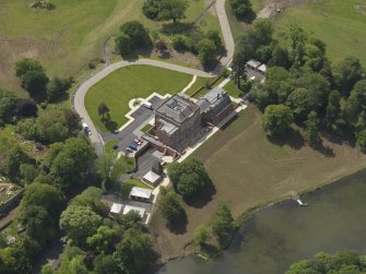 Oblique aerial view of Coodham House, taken from the NE.