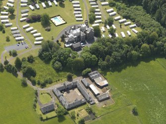 Oblique aerial view of Dankeith House and stables, taken from the N.