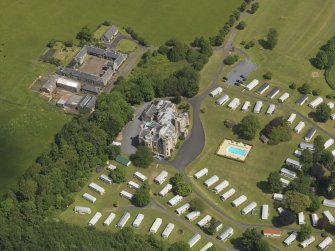 Oblique aerial view of Dankeith House and stables, taken from the S.