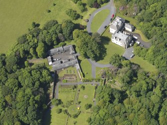 Oblique aerial view of Hillhouse and stables, taken from the E.