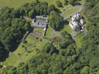 Oblique aerial view of Hillhouse and stables, taken from the ENE.