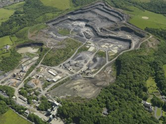 Oblique aerial view of Hillhouse Whinstone quarry, taken from the WNW.
