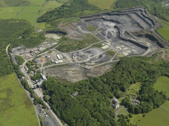 Oblique aerial view of Hillhouse Whinstone quarry, taken from the SW.