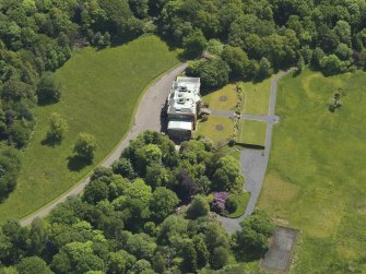 Oblique aerial view of Montgreenan House, taken from the NW.