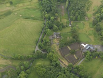 Oblique aerial view of Rowallan Castle and gardens, taken from the NE.
