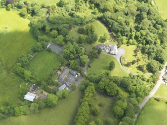 General oblique aerial view of Kennox House and policies, taken from the SW.