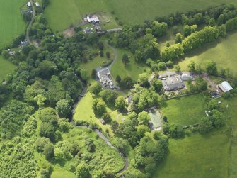 General oblique aerial view of Kennox House and policies, taken from the NNE.