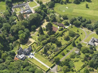 General oblique aerial view of Kelburn Castle and policies, taken from the NE.