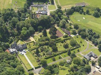 General oblique aerial view of Kelburn Castle and policies, taken from the NNE.