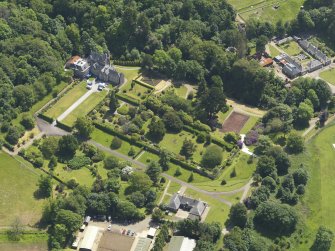 General oblique aerial view of Kelburn Castle and policies, taken from the WNW.