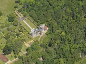 Oblique aerial view of Kelburn Castle, taken from the SSW.