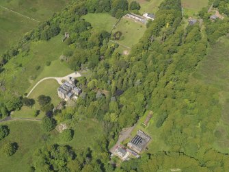General oblique aerial view of Knock Castle and policies, taken from the SE.