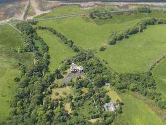 General oblique aerial view of Manor Park Hotel and stables, taken from the ENE.